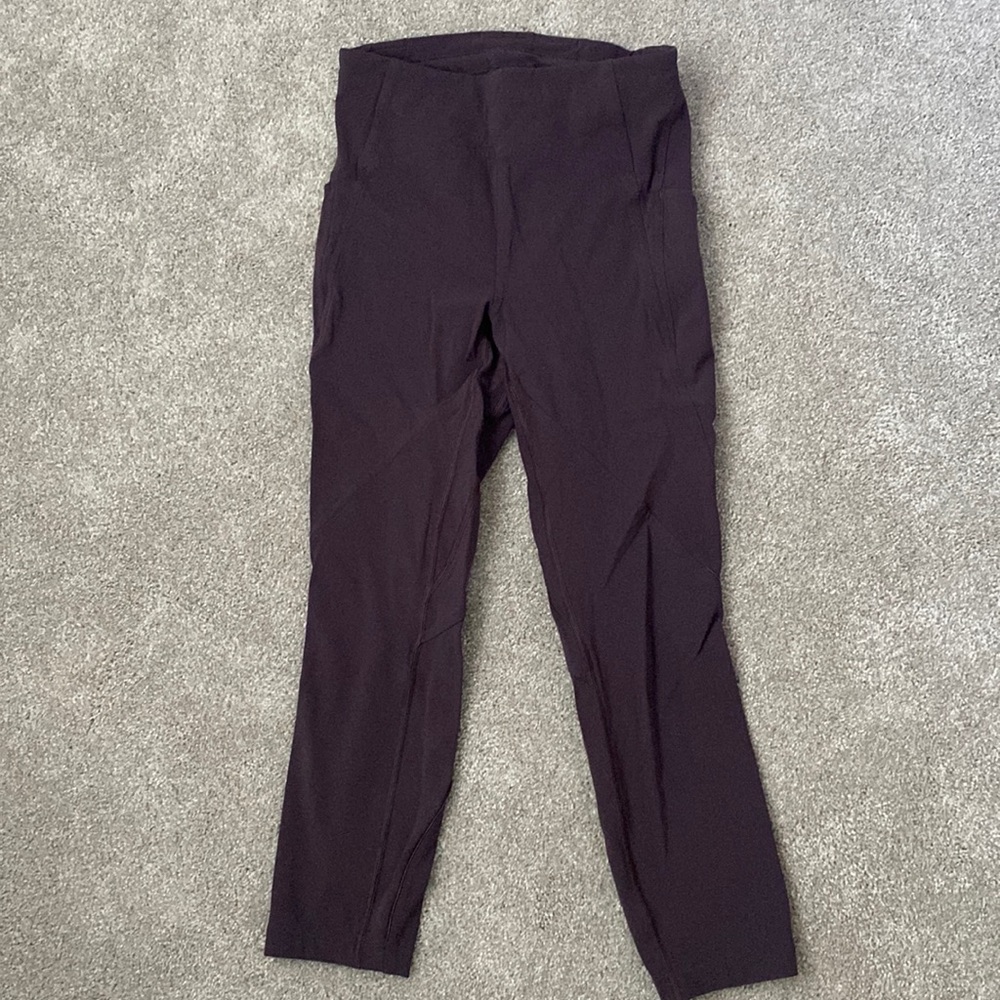 Purple running tight with side pockets